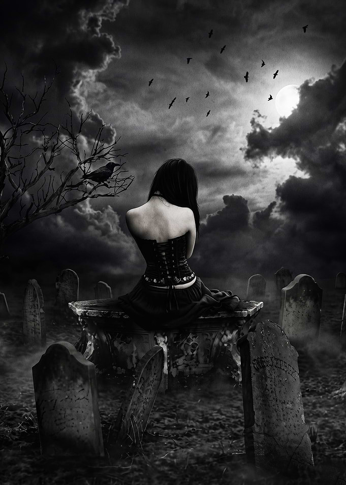 Gothic Woman Sitting in Graveyard