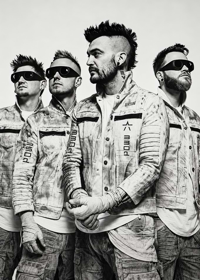 Starset band members in futuristic attire