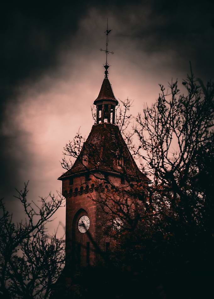Gothic Clock Tower Under Stormy Sky