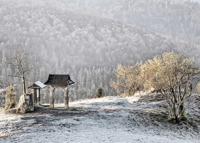 Frosty Mountain Landscape with Wooden Gate