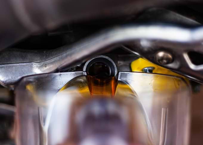 Draining Used Engine Oil