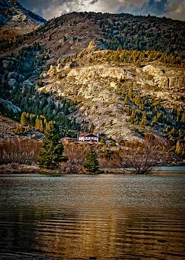 in between the mountains and the river