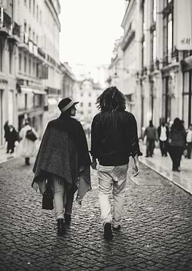 A couple in love walking through the streets of Lisbon, ...