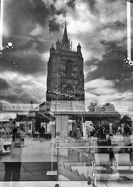 Church reflected in Forum windows, Norwich.