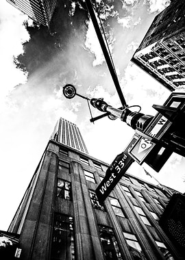 West 33rd street where the iconic Empire state building ...