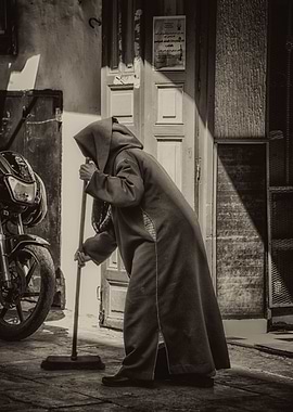 Moroccan Woman Sweeping