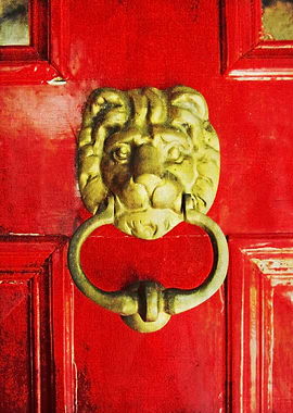 Golden Brass Lion On Red Door