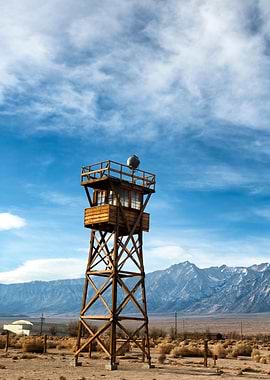 Taken along Route 395, the Manzanar watchtower in the d ...