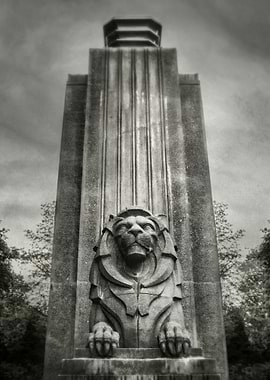 Sentinel. One of the two twin Lion statues at the entra ...