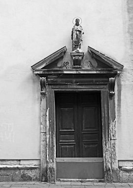 Religious Figure and Architectural Detail in Venice