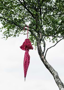 red umbrella with polka dots