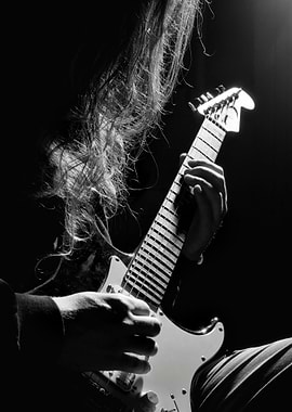 Long hair man playing guitar, anonymous guitarist perso ...
