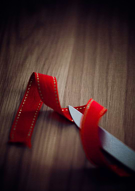 Knife and Red Ribbon