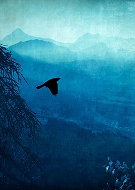 View of Italian alps on a hazy morning with a bird