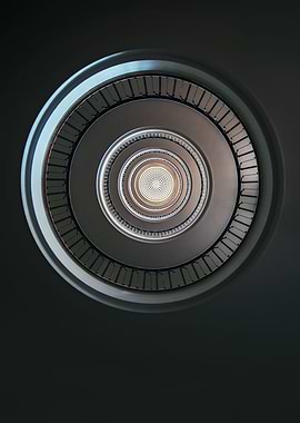 Round staircase with nice ceiling. View from the bottom ...
