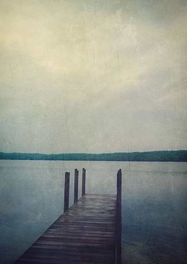 A moody photograph of a dock on a stormy day.
