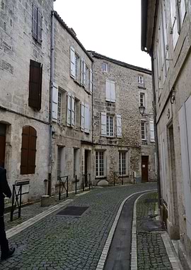 A rainy day in an old street with traditional architect ...