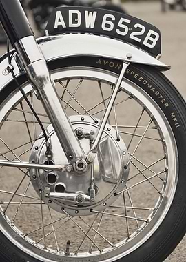 Close up of a front wheel and drum brake of a classic B ...