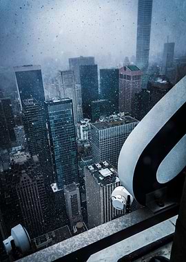 Cityscape View From Rockefeller Center in A Snow Storm