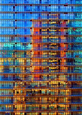 A tower block reflected in