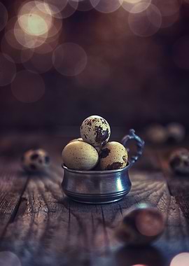 Quail's eggs on wood aces