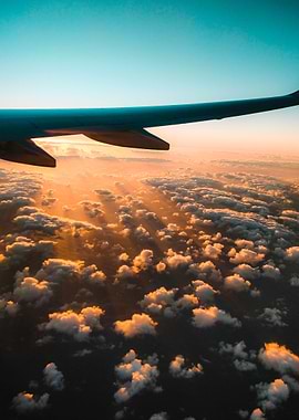 Sunset over the clouds