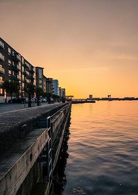 BY THE H A R B O U R