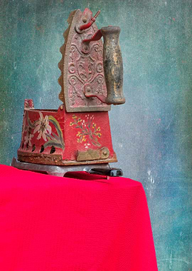 old iron on red carpet