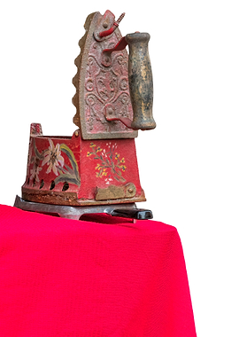 isolated old iron on red