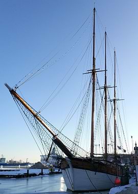 Fish boat in the ice lake