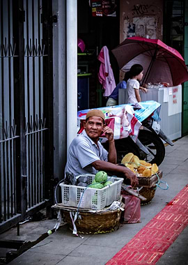 An Old Man with His Fruit