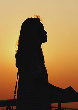 Woman looking over railing
