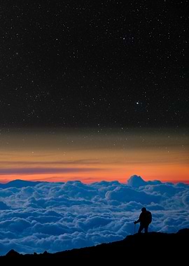 Climber above the clouds