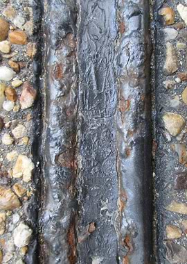 Sidewalk Grate Edge I