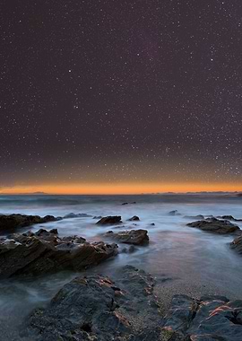 Night sky above the beach
