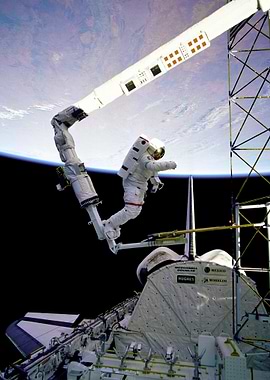 Astronaut Above Earth