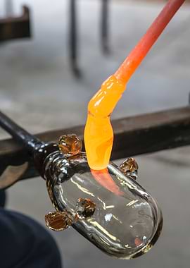 Glassblower molten glass