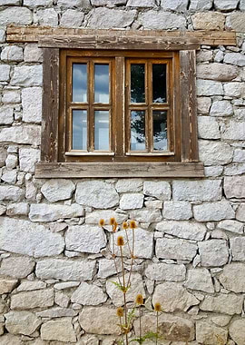 A wooden window on a wall
