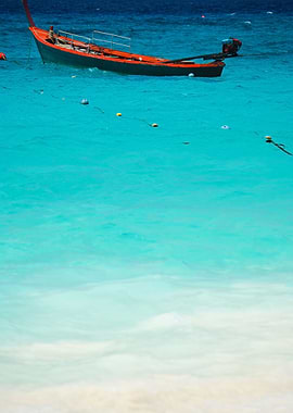Red Boat On Beautiful Blue