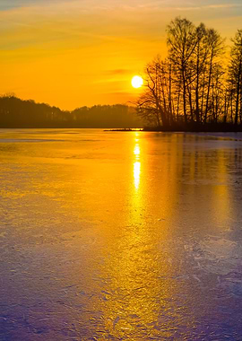 Frozen Lake At Sunrise Or