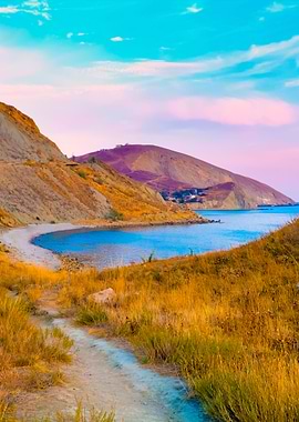 Sunset Over A Rocky Coast