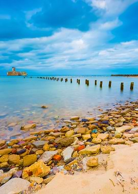 Beach With Old Military Bu