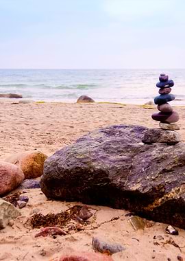 Balanced Pepples At The Ba