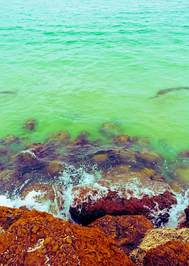 Waves On A Rocky Beach At