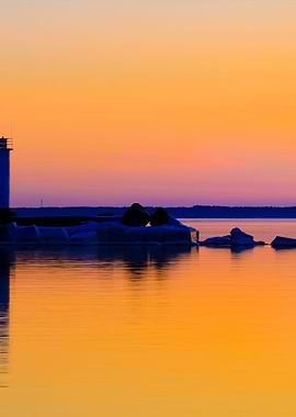 Lighthouse In The Sea At T