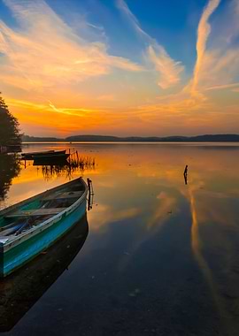 Sunset Lake With Fisherman