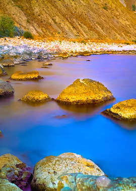 Rocky Beach At Sunset Ligh