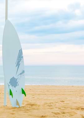 Surf Board In The Sand At