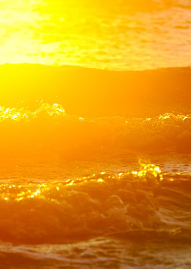 Waves CloseUp At The Sunse