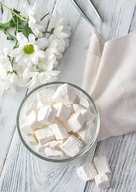 Glass bowl of white sugar